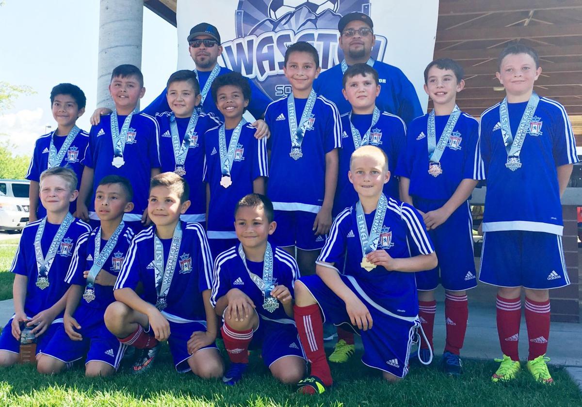 Elite FC boys soccer teams take home championship and a 2nd place at