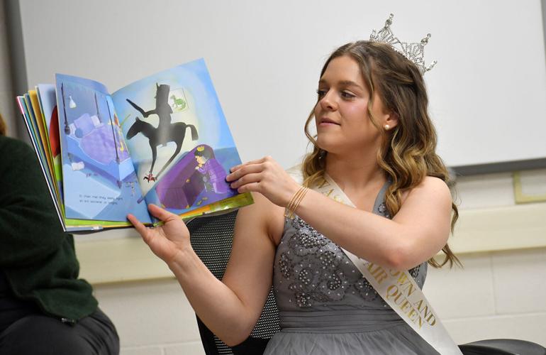 Maria Hellebusch reads at Family Reading Night