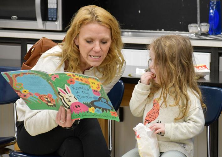Audrey Whited reads to Phoenix Whited