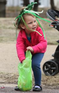 Sawyer Eime stuffs candy into her bag