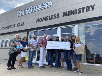 Hope Outreach Ministries receives cash, material donations ...