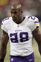 Nike Suspends Adrian Peterson Endorsement Deal as Vikings Apologize