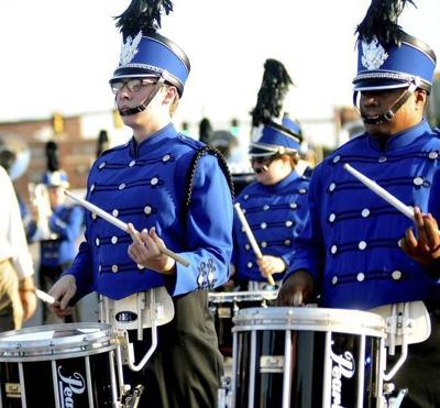 enid band perform tri state enidnews parade march members during last been school year blue big