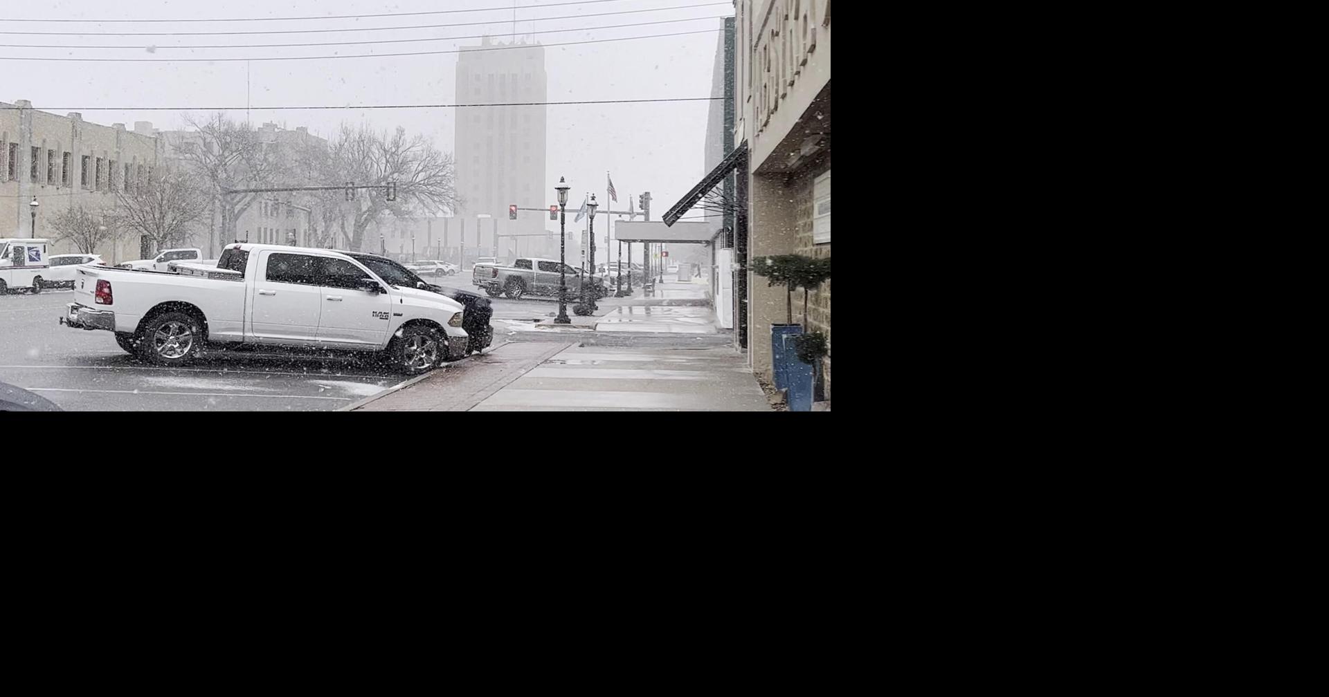 Snow falling in downtown Enid Multimedia