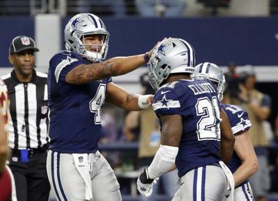 Cowboys down Redskins 31-26 for franchise regular-season record