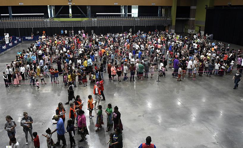 Kids, families come out for annual Feed the Neighborhood ...