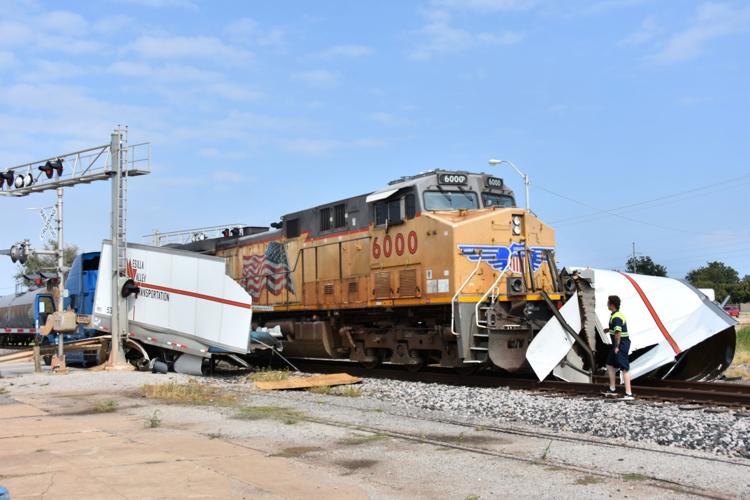 UPDATE: Train hits semi on Garriott tracks near 2nd; truck ...