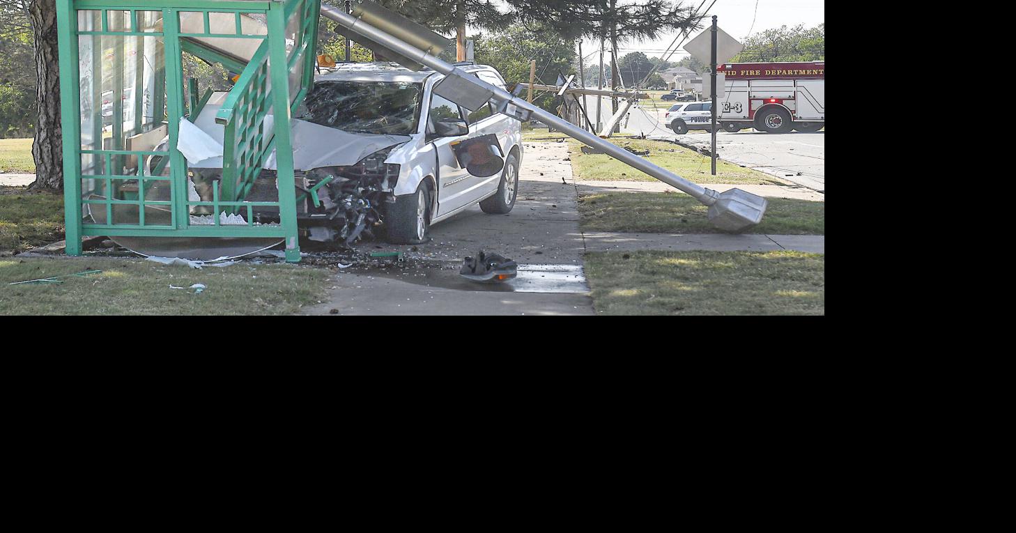 UPDATED Driver arrested after accident destroys utility pole, bus stop