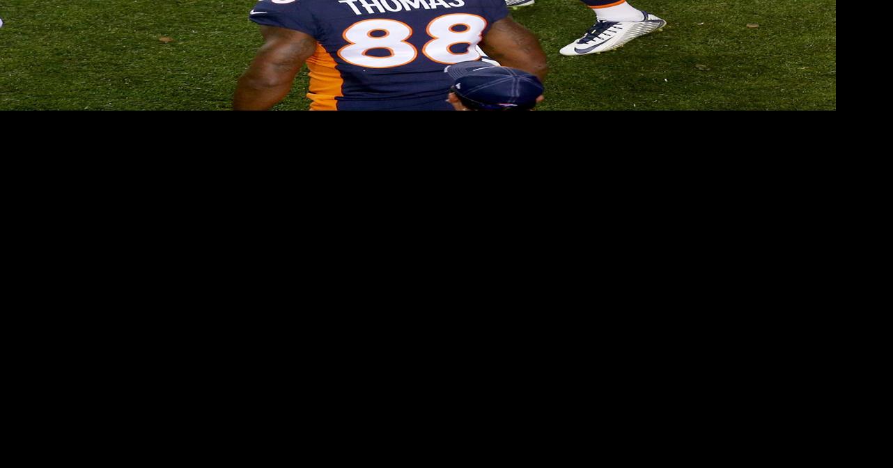 Quarterback Peyton Manning (18) congratulates Demaryius Thomas (88) after  scoring a touchdown – Denver Broncos History