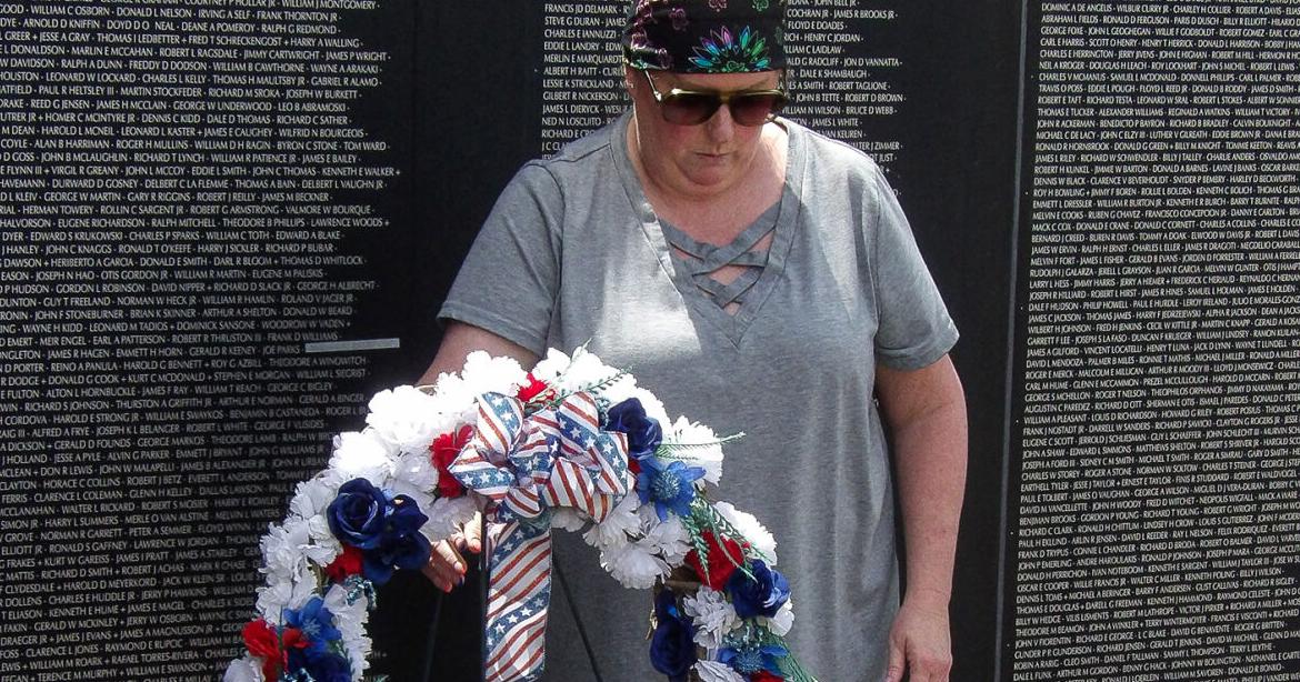 ABATE members present wreath at Vietnam Memorial Wall