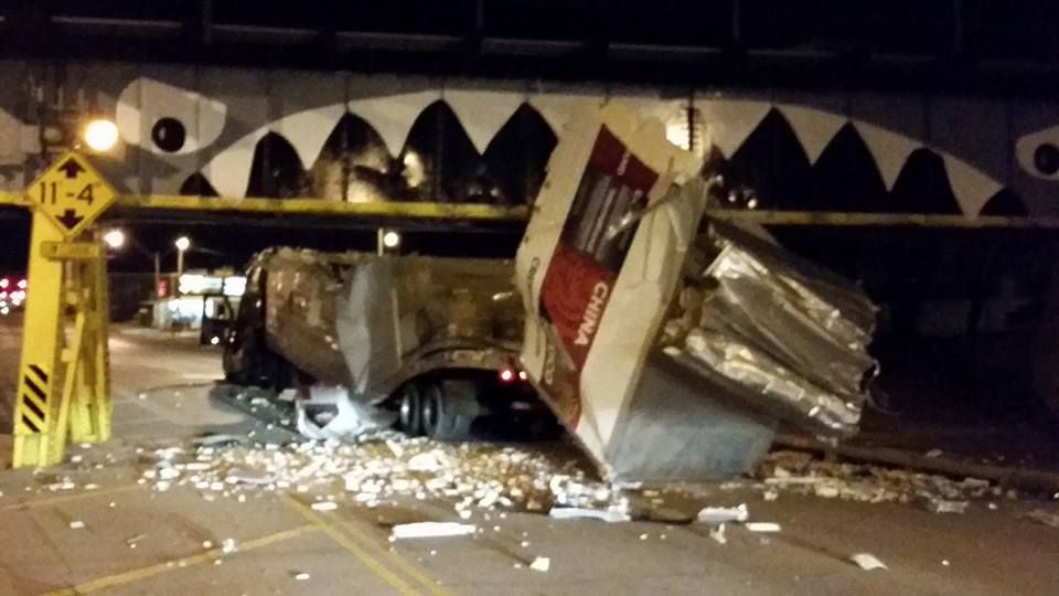 Truck hits Maine Street railroad bridge