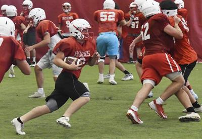 chisholm football enid enidnews pads excited runs billy hefton lane practice smith ball friday august during school
