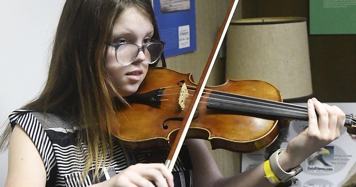 Enid girl chases dream playing violin - Vimarsana News