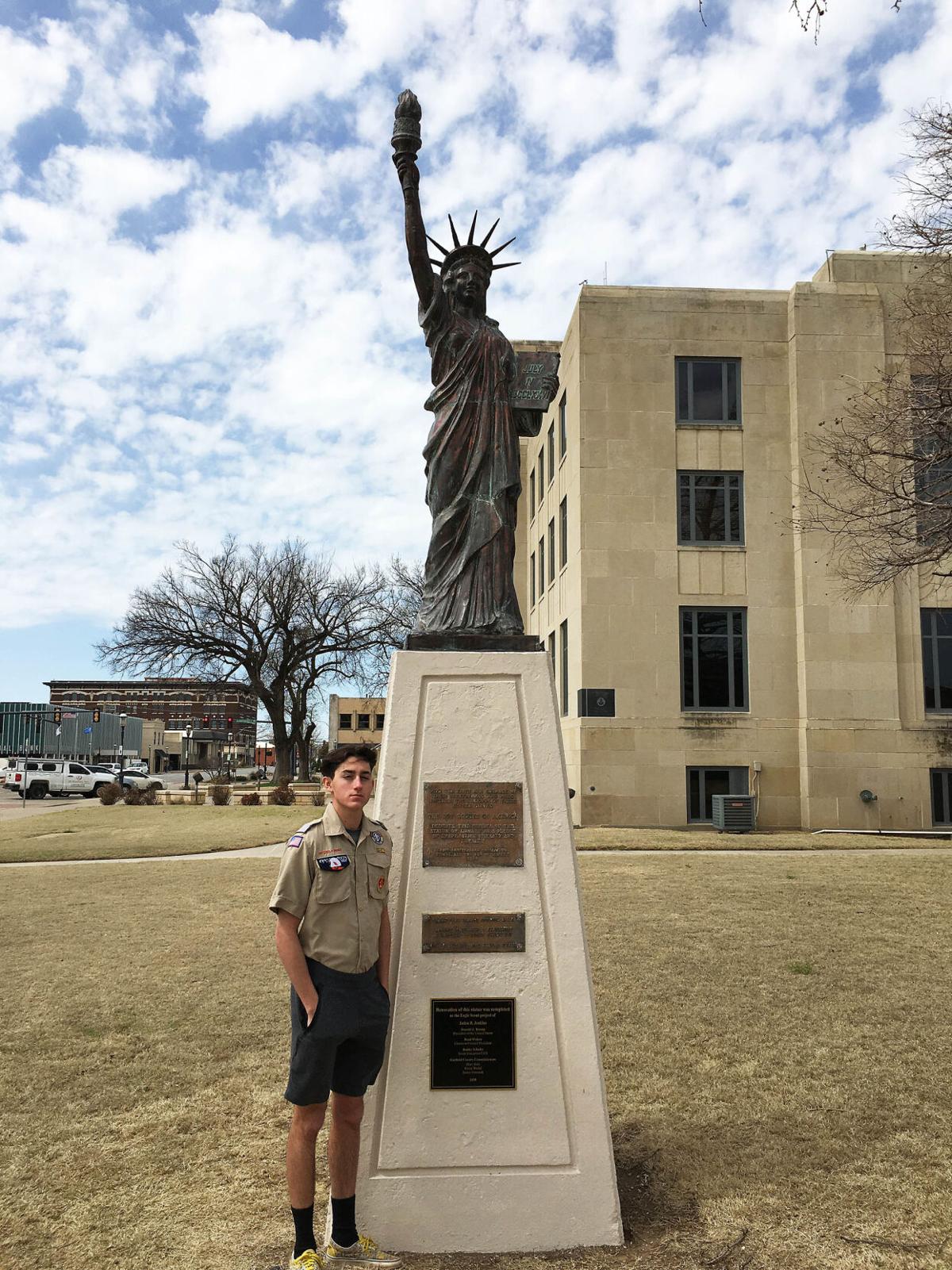 Boy Scout earns Eagle rank after restoring Enid's Statue of Liberty
