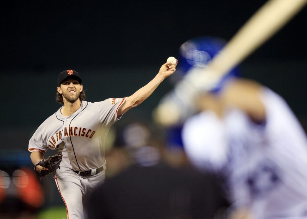 Bumgarner leads Giants past Royals