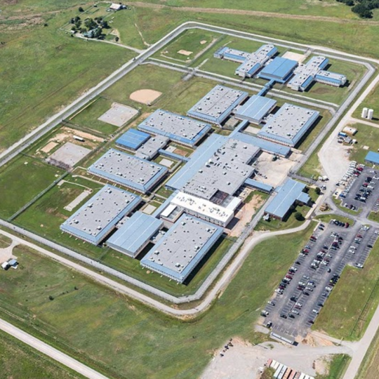 Oklahoma’s largest private prison plagued by gang violence and