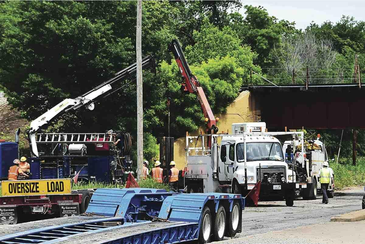 Semi driver who struck railroad bridge sought News
