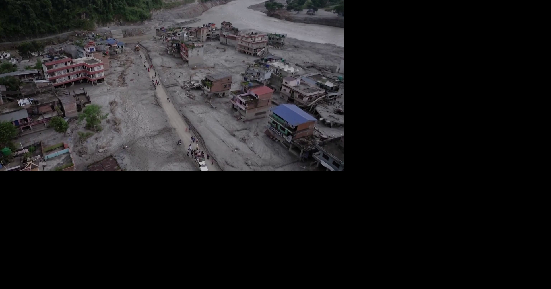 Local Community Holds Vigil for Victims of Devastating Nepal Floods