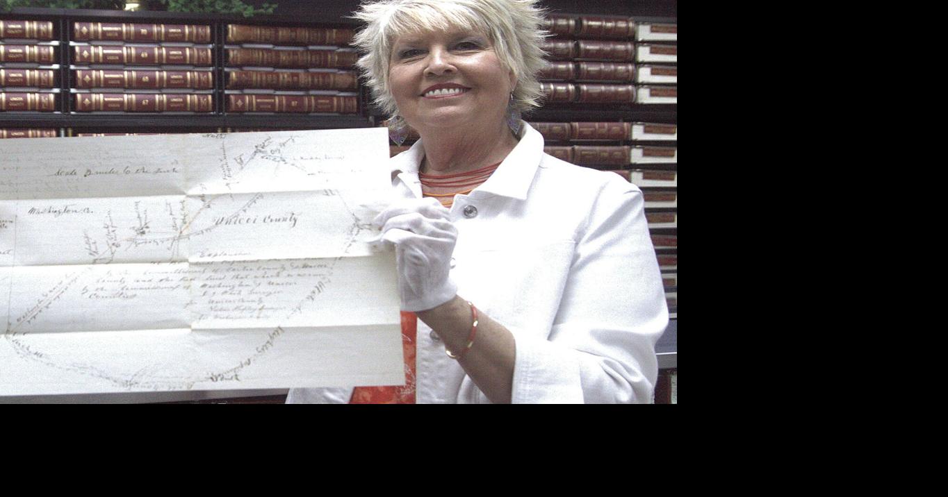 Opening a book leads to discovery of historic document at county