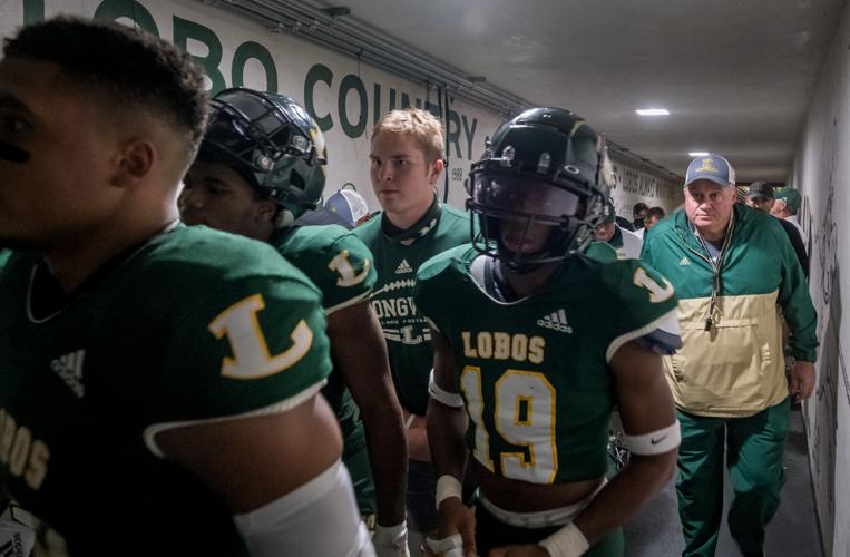 Lobos tough to beat under King in playoff openers Longview