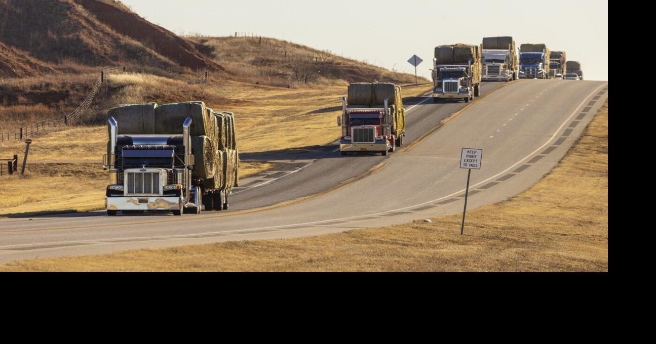 Pitching in by pitching hay: Arkansas farmers a…
