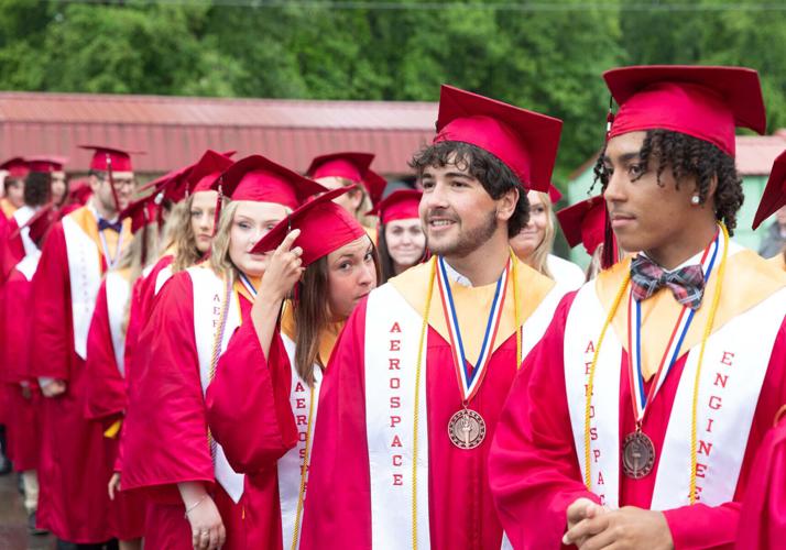 Students prepare to receive diplomas