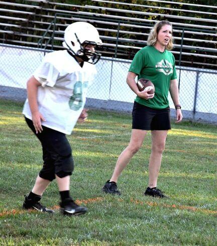 Mom of three tackling football coaching role