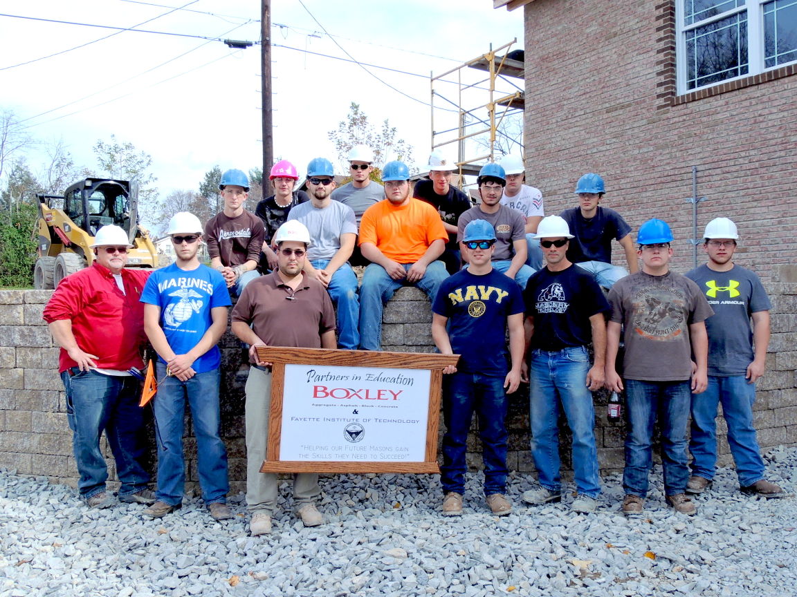 FIT students complete training build retaining wall through