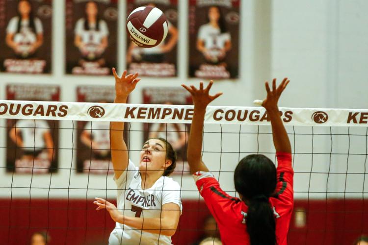 Lady Cougars pick up first district win