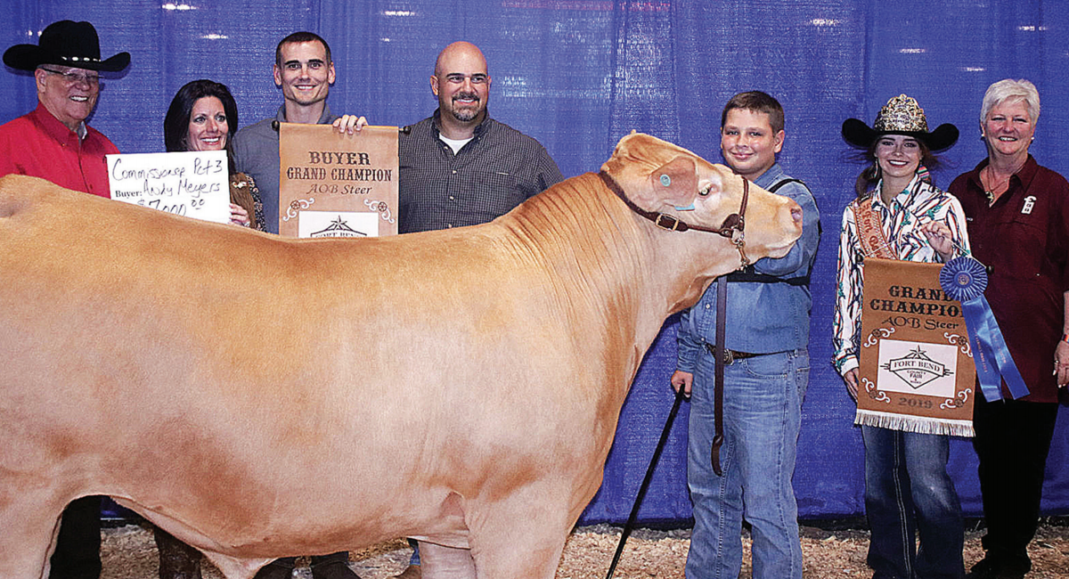 Grand and reserve champ livestock fetches $83,700 at Fair’s junior auction
