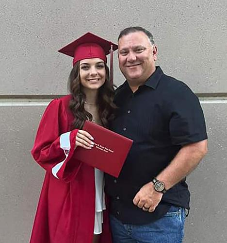 Happy graduate and dad