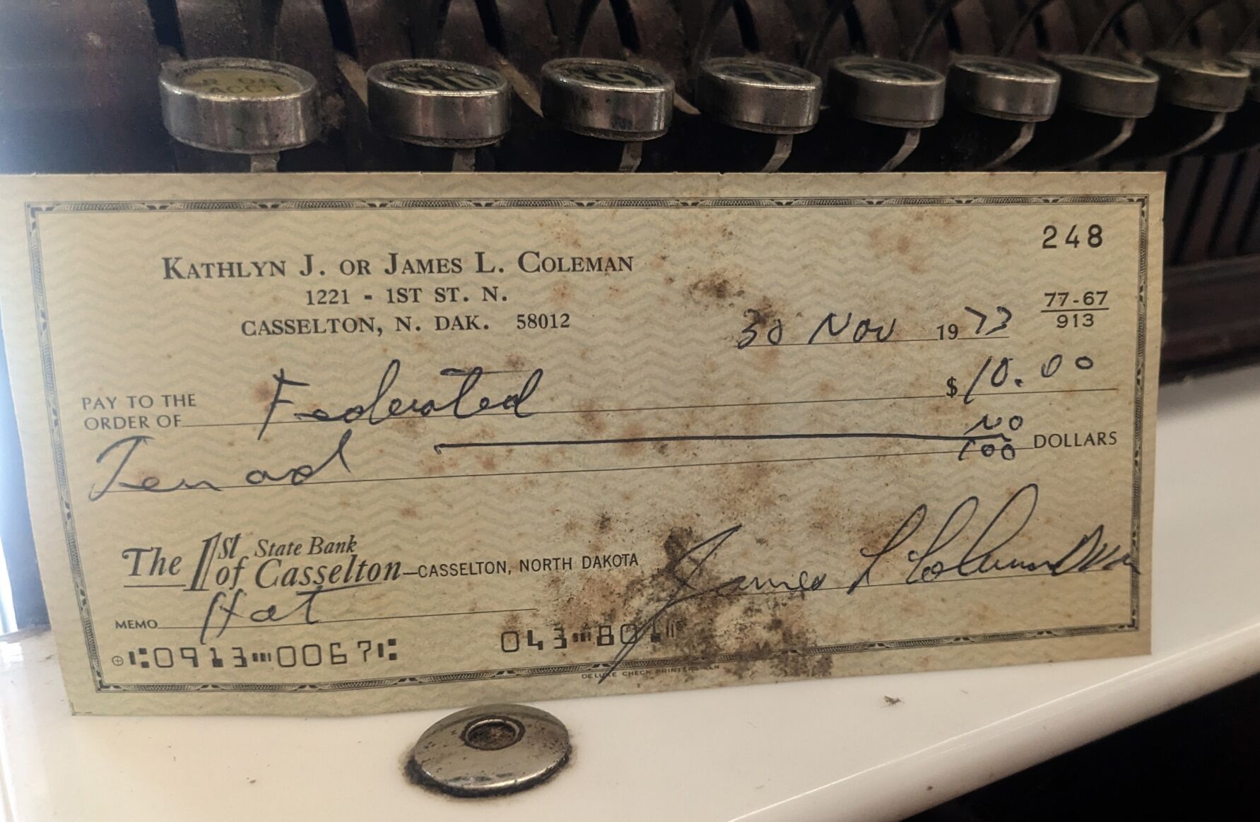 Surprise find Old check surfaces at Ben Franklin News