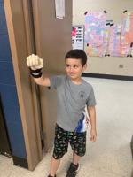 Printing done for a purpose: Local students give young boy a hand