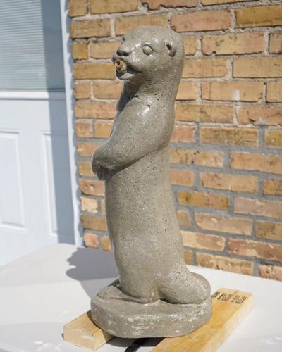 A splashing return: Historic otter statues will reappear downtown ...