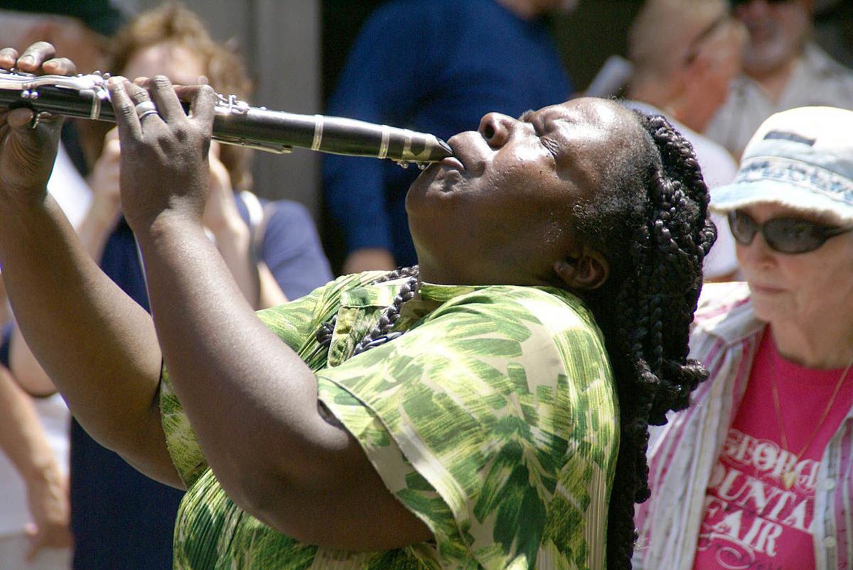 Image result for women playing clarinet in new orleans on the street