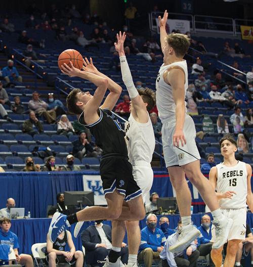 4-6 paintsville colby fugate shot over two defenders.jpg