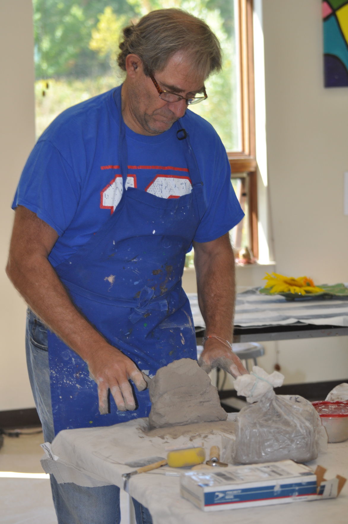 A handful of fun! Adults enjoy Geneva ceramics class Lifestyle