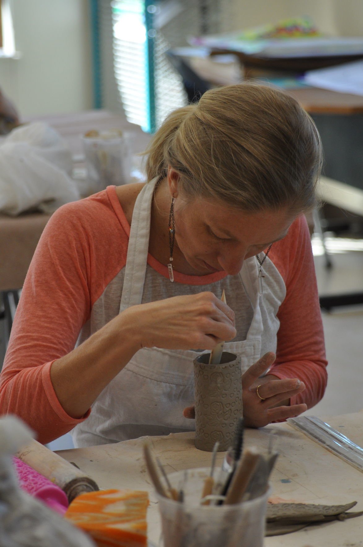 A handful of fun! Adults enjoy Geneva ceramics class Lifestyle