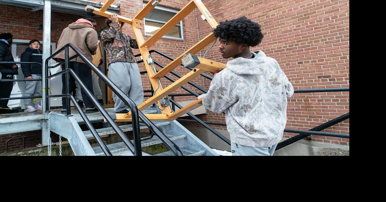 MAKING A DIFFERENCE: Geneva group saves reusable materials from soon-to-be demolished classroom building