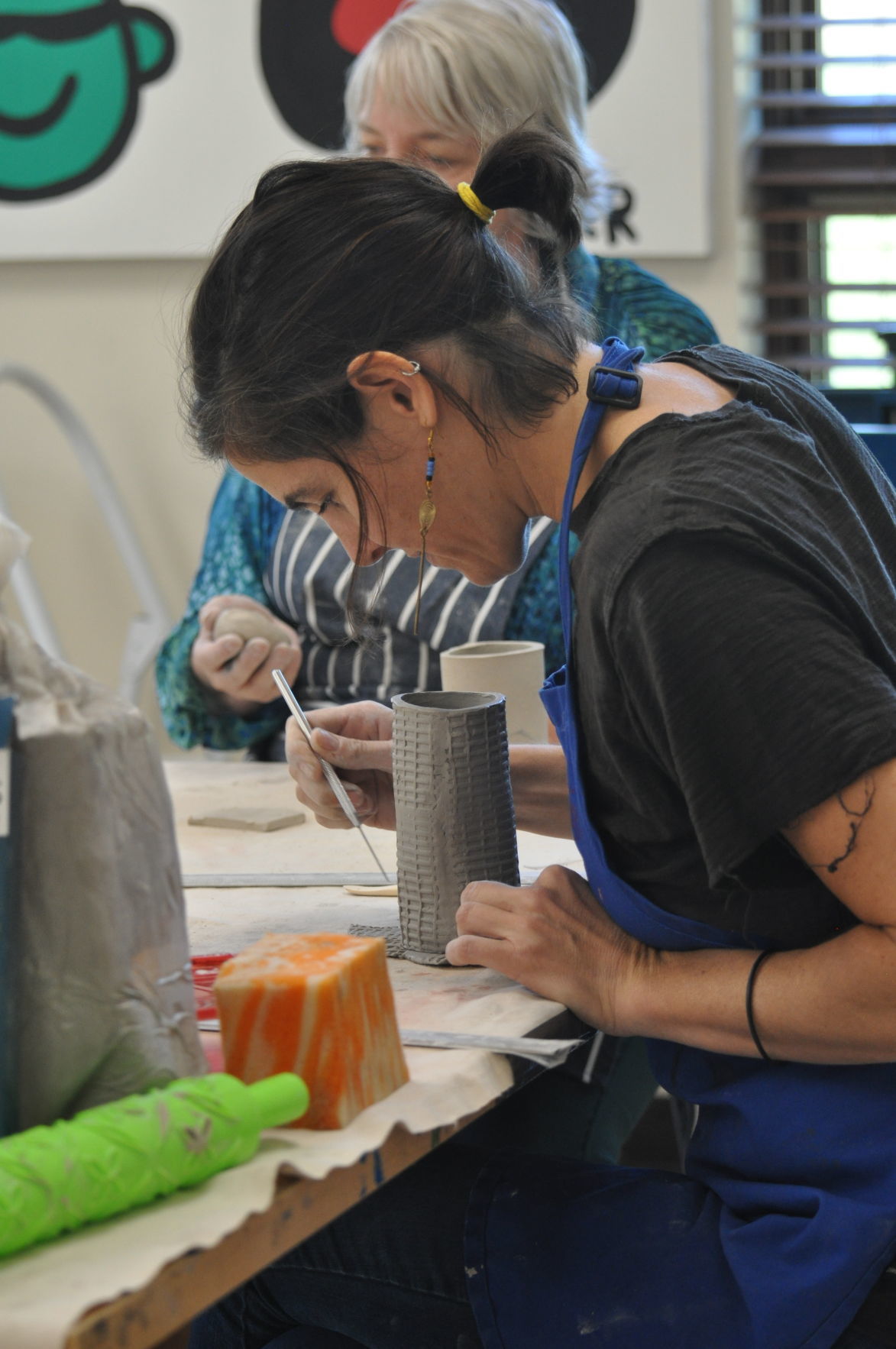A handful of fun! Adults enjoy Geneva ceramics class Lifestyle