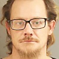 Two arrested, charged with exploiting Yates County man's finances