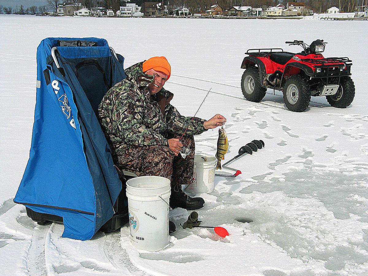OUTDOORS: Ice Fishing From my Dock!, Sports
