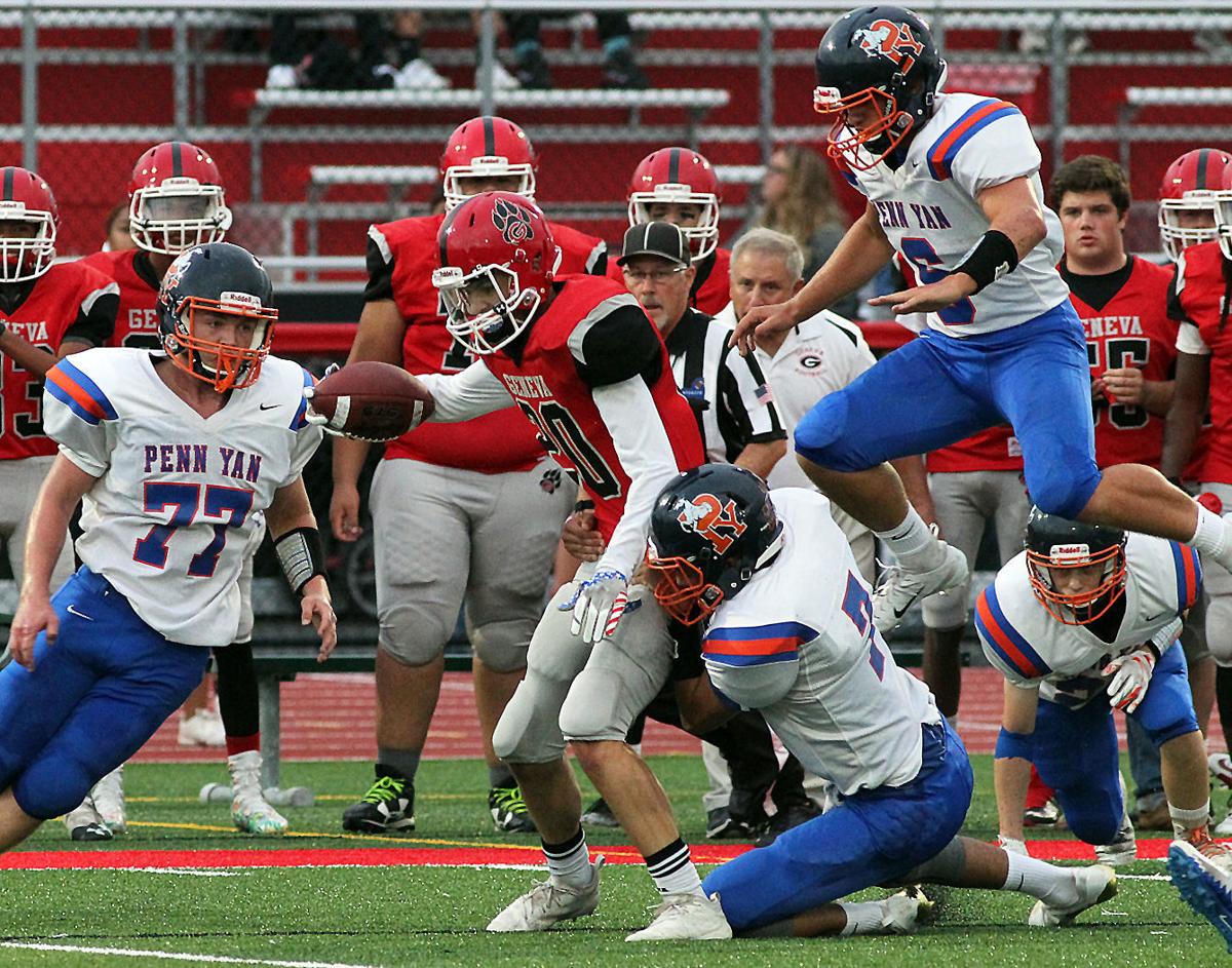 High School Football Mustangs Gallop Over Geneva At Loman Stadium