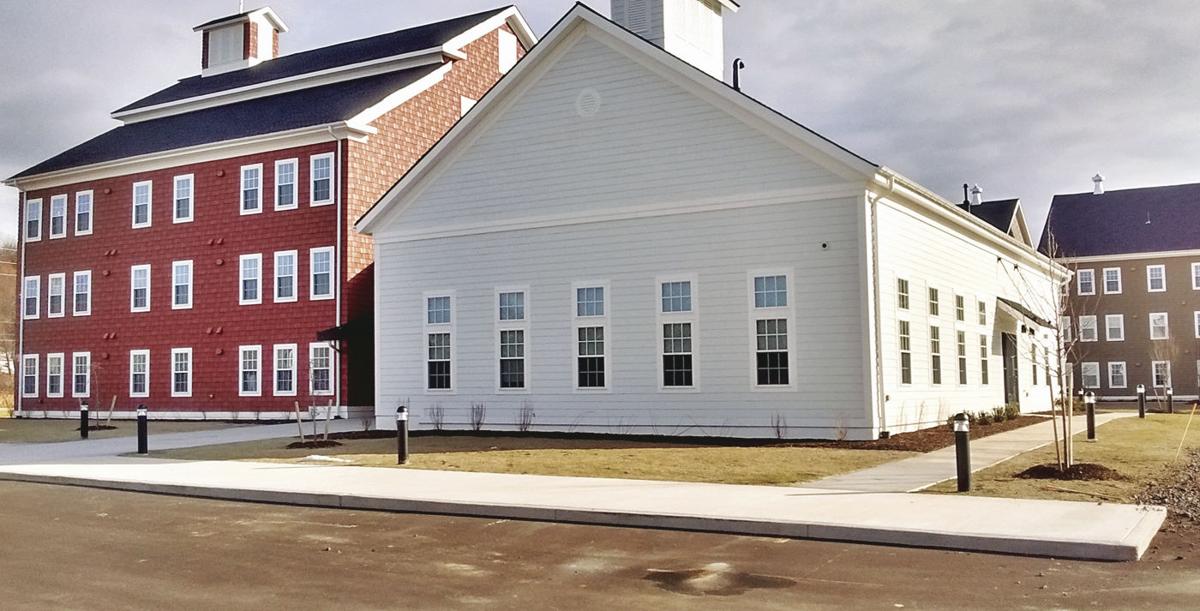 Housing project meets dual needs Woodland Commons designed for people