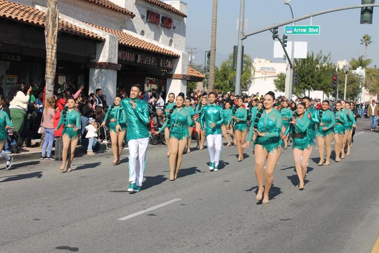 Dancers, cheerleaders perform during Fontana Christmas Parade; see