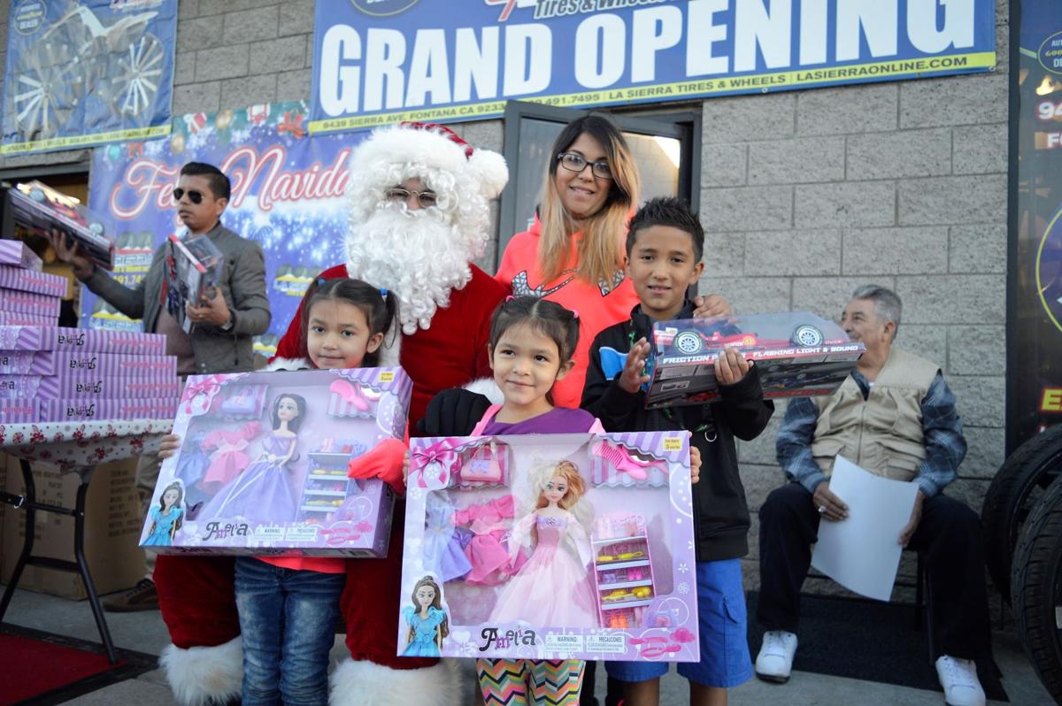 La Sierra Tires >> Many children receive toys during grand opening of La La Sierra Tires >> Many children receive toys during grand opening of La