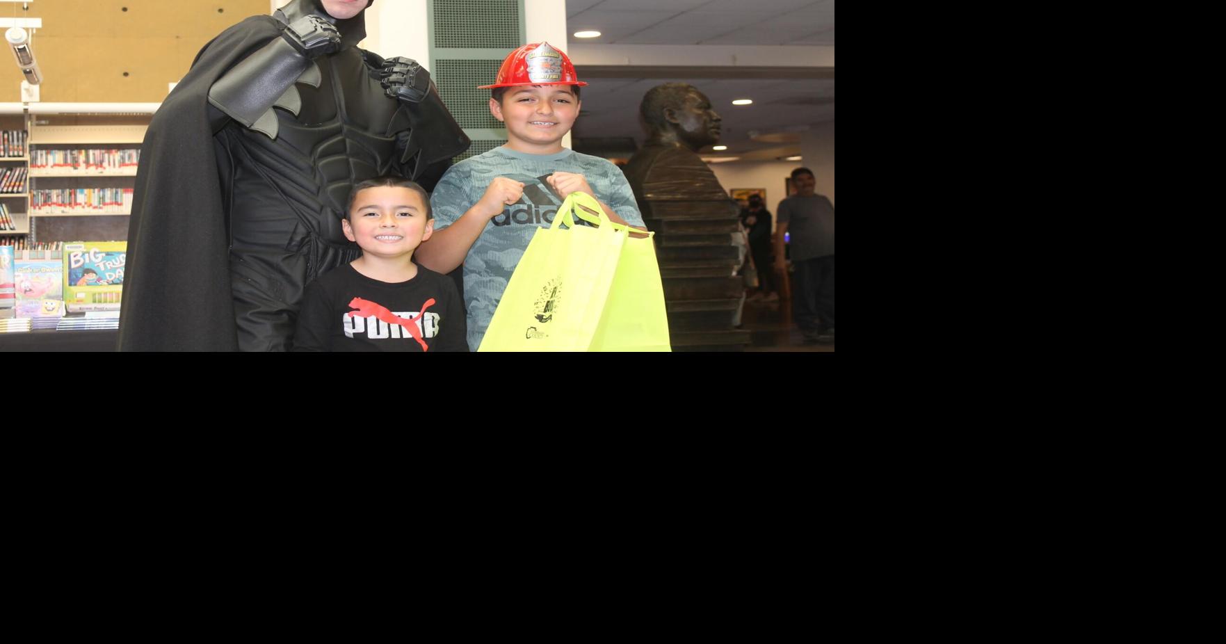 Families enjoy New Book Festival at Lewis Library in Fontana; see ...