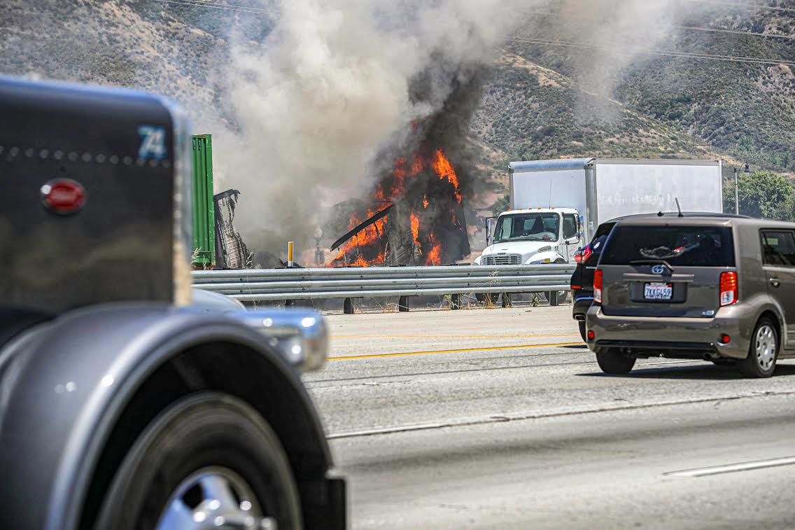 Semi truck bursts into flames on Interstate 15 Freeway in Fontana on