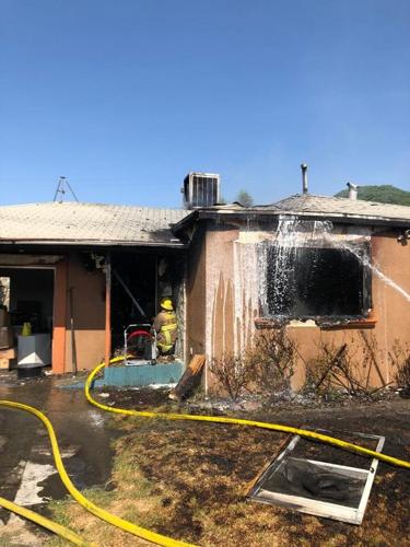 Man is arrested for allegedly setting a fire which damaged a house in ...