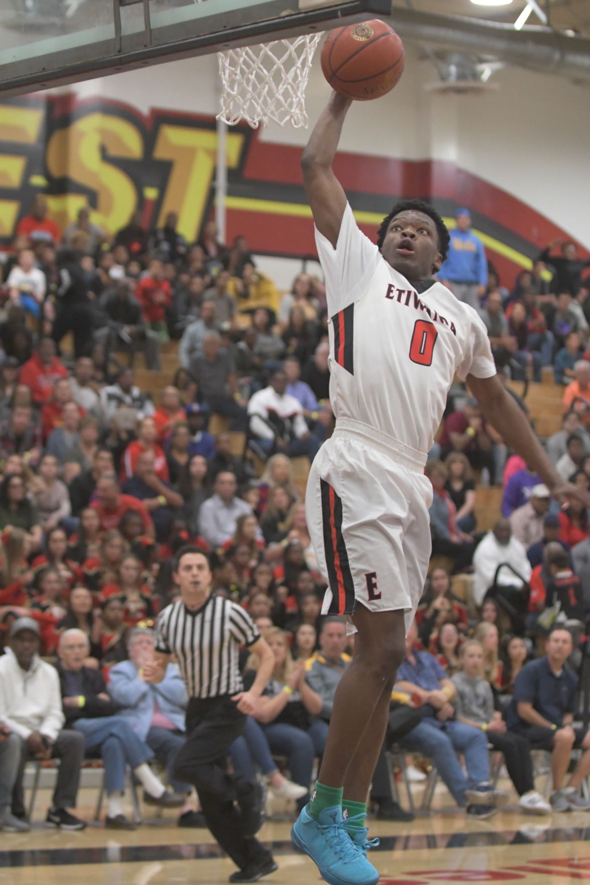 Etiwanda basketball men hold on for victory in opener of CIF playoffs